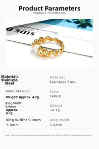 Macro detail of 14K gold plated twist ring with freshwater pearl and steel texture