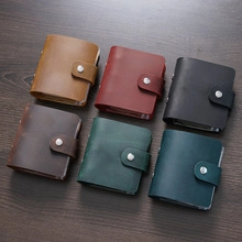 Detail view of crazy horse leather card holders in six vintage colors with metal snaps