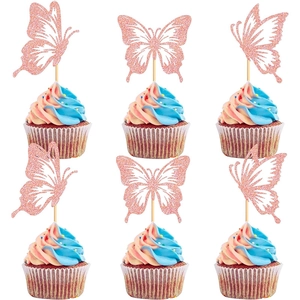 Detailed view of pink glitter hollow butterfly cake toppers on decorated cupcakes