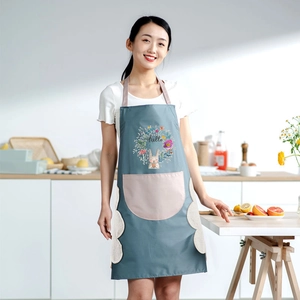 Waterproof kitchen apron with floral rabbit pattern, pink pocket, and side hand towels