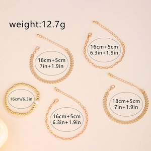 Elegant 5-piece gold bracelet set with herringbone chains and bead strands for women