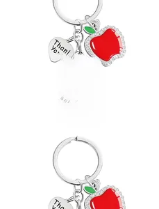 Detailed view of silver apple keychain with rhinestones and Thank You heart pendant