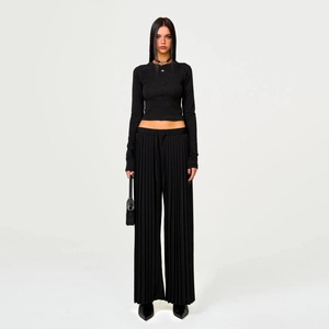 Women's black pleated wide-leg trousers and long-sleeve crop top minimalist set