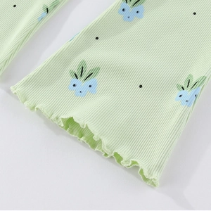 Legging évasé vert clair côtelé avec imprimé floral bleu et bordure ondulée