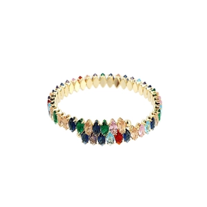 Detailed macro of gold-plated bracelet with multi-colored marquise zirconia crystals