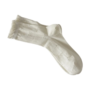 Off-white cotton knit crew socks with delicate bow jacquard and frilly lettuce trim