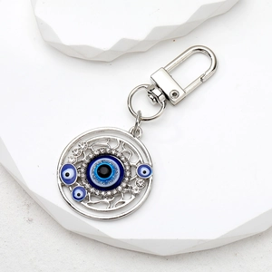 Vintage evil eye keychain with blue heart rhinestones and silver metal hook for women