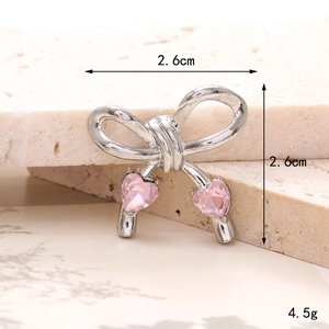 Silver bow shoe charm with pink heart crystals on stone base, size 2.6cm x 2.6cm