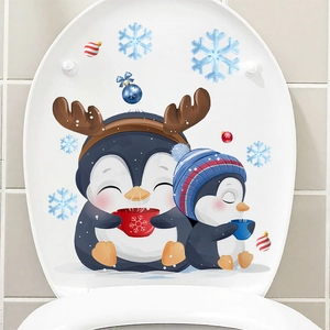 Detailed view of Christmas penguins with snowflakes on a self-adhesive toilet seat sticker
