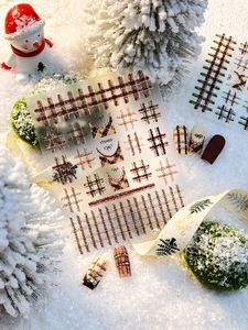 Detailed view of YT6460 Christmas nail art stickers featuring plaid and bow patterns