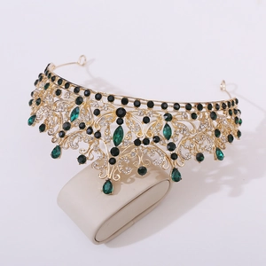Luxury bridal crown with green crystals and sparkling rhinestones on gold base