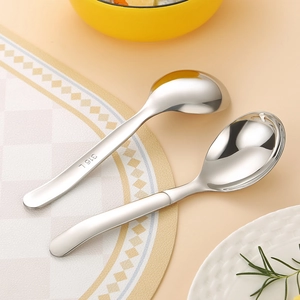 Deepened 316 stainless steel round soup spoon and dessert spoon set on a dining table