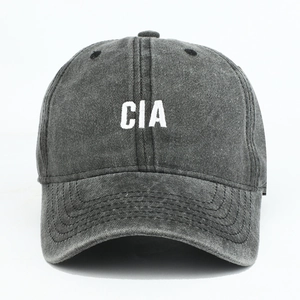 Vintage washed charcoal baseball cap with white CIA embroidery and curved brim