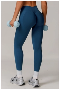 Detail view of high waist scrunch butt yoga pants with a seamless ruched lifting design