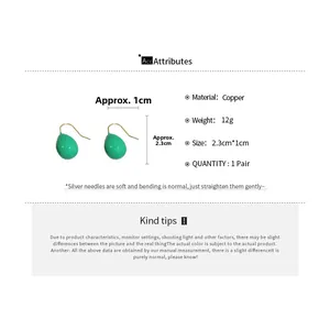 Detail specifications of green enamel teardrop earrings with silver needles and copper base