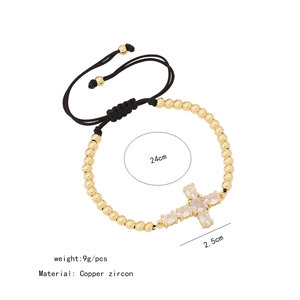 Detail showing 24cm gold zircon cross bracelet dimensions and adjustable chain length