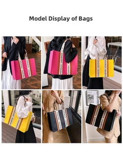 Detail of MOMPICK oversized felt tote bag handles with thick woven strap and embroidery