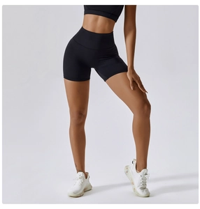 Detailed macro view of the high-waist elastic band and sleek fabric texture of sports shorts