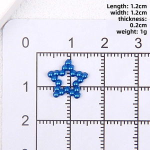 Macro view of blue star-shaped pearl bead with dimensions 1.2x1.2 cm for DIY crafts