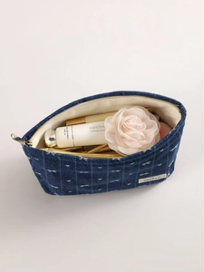 Retro denim makeup bag with white heart patterns and spacious interior for cosmetics