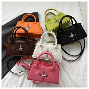 Flat lay view of multiple colored square bags featuring silver star metallic buckles