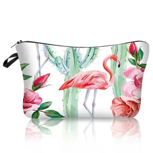 Detailed view of the flamingo and rose floral print on a polyester makeup bag
