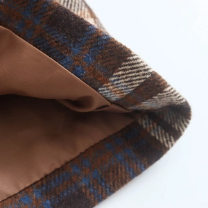 Short vintage plaid tweed jacket in brown and blue with soft brown lining detail