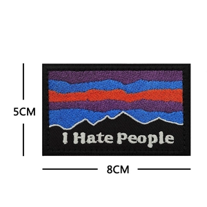 Rectangular mountain silhouette patch with I Hate People embroidery in vibrant colors