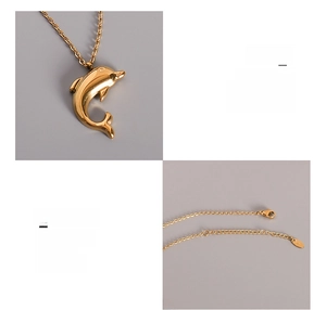 Detail of 18K gold plated surgical titanium dolphin pendant with lobster clasp and chain