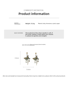 Détail de boucles d'oreilles papillon à pompons, poids 35,4 g et longueur 4,5 cm