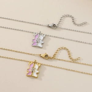 Minimalist stainless steel bear pendant necklace with diamond flower and enamel inlay