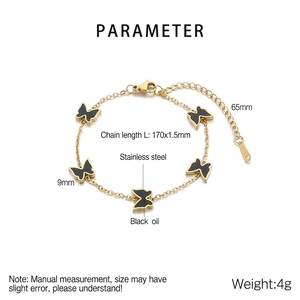 Golden titanium steel bracelet featuring black butterfly charms with lobster clasp details