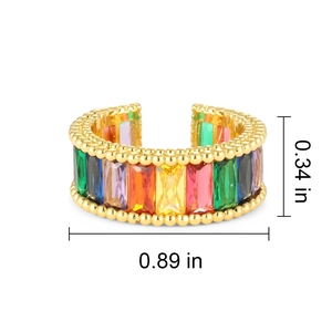 Adjustable gold open ring with rainbow rectangular crystals measuring 0.89 by 0.34 inches