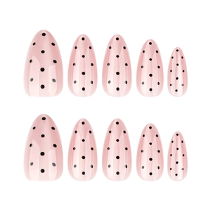 Pink almond press-on nails with black polka dots and cat-eye glitter finish