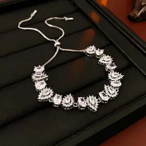Adjustable silver bracelet with waterdrop and oval zircons in a premium jewelry box