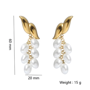 Golden wing tassel earrings with white pearls, size 60mm by 20mm, stylish minimalist jewelry