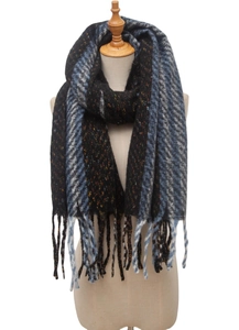 Detail of knitted stripe scarf with blue and grey accents and fringe on mannequin