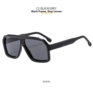 Side view of retro oversized black square sunglasses with grey lenses and thick frame