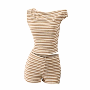 Detail of the brown striped knit fabric texture on a two-piece crop top and shorts set