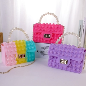 Pop fidget silicone handbag for girls with pearl handle and metal chain in vibrant colors