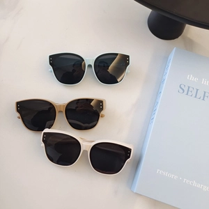Kids retro oversized sunglasses in mint green, khaki brown, and beige colors