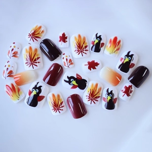 Short square press-on nails set with autumn maple leaf and turkey designs for Thanksgiving
