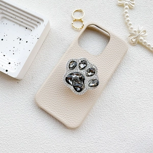 Luxury rhinestone cat paw phone socket holder on beige lychee grain leather phone case