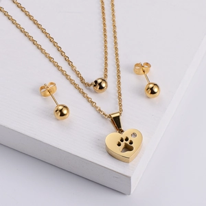 Parure de collier double doré et boucles d'oreilles boules avec pendentif cœur