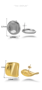 Detailed view of silver polished circular and gold textured square titanium steel earrings