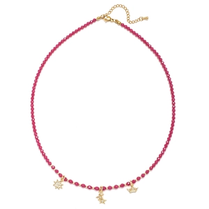 Detail of bohemian beaded necklace featuring rose red stones and gold star charms