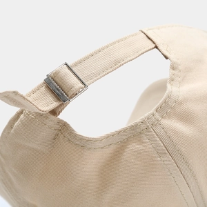 Beige cotton baseball cap with adjustable metal buckle closure and fine stitching details