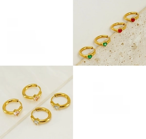 Close-up of gold plated stainless steel mini hoop earrings with colorful zircon stones