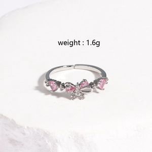 Elegant silver bow ring with pink heart stones and adjustable open band for women