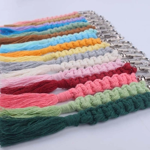 Handmade woven cotton keychains with metal lobster clasps and tassels in various colors